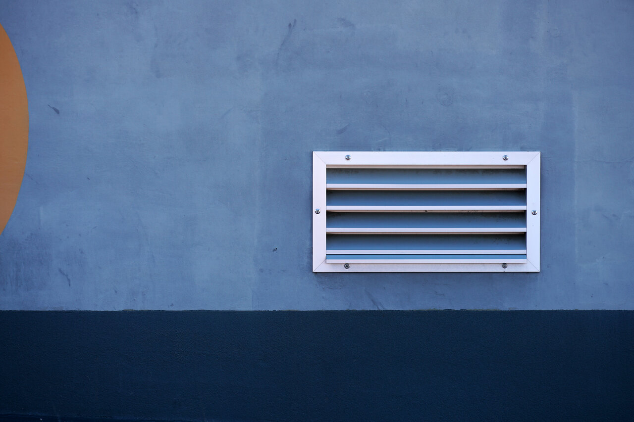 rsz closeup shot of a small air vent on a blue colored 2023 11 27 05 32 04 utc